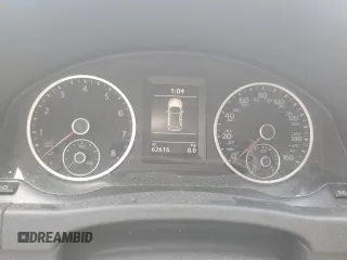2014 Volkswagen Tiguan S z VIN WVGBV3AX7EW545782, wystawiony jako Copart lot #58711824 z przebiegiem 62 616 mil mil oraz Szkoda całkowita • Salvage title. Historia ofert i sprzedaży dostępna na DreamBid. Obrazek 9.