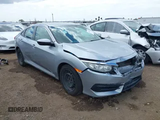 2018 Honda Civic LX with VIN 2HGFC2F50JH500559, listed as a IAAI auction lot 42040271 with 82,026 mi miles and . Bid and sale history available at DreamBid. Image 1.