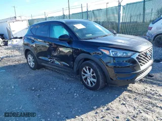 2019 Hyundai Tucson Value with VIN KM8J3CA40KU878596, listed as a IAAI auction lot 41021774 with 79,903 mi miles. Bid and sale history available at carsss.com. Image 1.