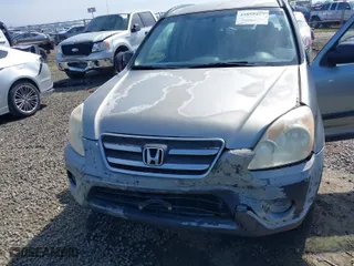 2006 Honda CR-V LX with VIN JHLRD68516C006561, listed as a IAAI auction lot 41855457 with 215,139 mi miles. Bid and sale history available at carsss.com. Image 6.
