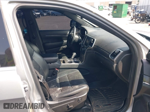 2018 Jeep Grand Cherokee Limited with VIN 1C4RJEBG6JC159472, listed as a IAAI auction lot 42378999 with 122,426 mi miles and . Bid and sale history available at DreamBid. Image 5.