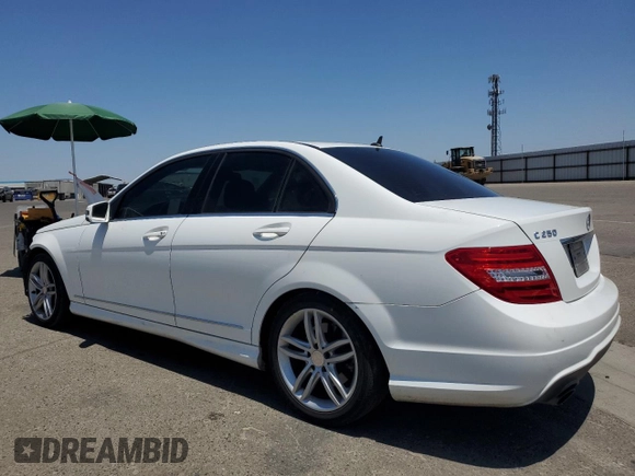 2014 Mercedes-Benz C 250 Sport with VIN WDDGF4HB3EG247401, listed as a Copart auction lot 62551635 with 118,342 mi miles and Salvage title. Bid and sale history available at DreamBid. Image 2.
