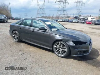 2016 Audi A6 2.0T Premium Plus with VIN WAUGFAFC7GN095669, listed as a IAAI auction lot 41894313 with 84,725 mi miles. Bid and sale history available at carsss.com. Image 1.
