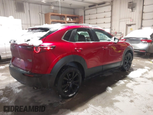 2022 Mazda CX-30 2.5 Turbo with VIN 3MVDMBAY5NM427943, listed as a IAAI auction lot 41585519 with 32,807 mi miles and . Bid and sale history available at DreamBid. Image 4.