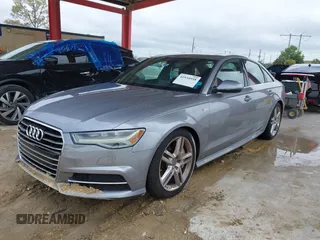 2016 Audi A6 3.0T Premium Plus with VIN WAUFGAFC1GN047352, listed as a IAAI auction lot 41934958 with 111,834 mi miles. Bid and sale history available at carsss.com. Image 6.