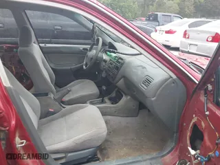 1997 Honda Civic LX "O" w/Air with VIN 1HGEJ6672VL019621, listed as a IAAI auction lot 42081226 with 194,957 mi miles. Bid and sale history available at carsss.com. Image 5.