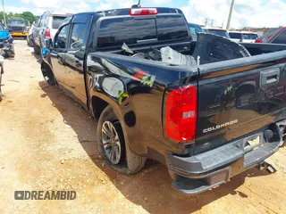 2022 Chevrolet Colorado 4WD Z71 z VIN 1GCGTDEN5N1327500, wystawiony jako IAAI lot #42265450 z przebiegiem 48 680 mil mil oraz . Historia ofert i sprzedaży dostępna na DreamBid. Obrazek 3.