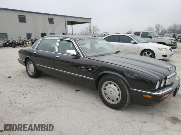 1999 Jaguar XJ z VIN SAJKD6043XC872105, wystawiony jako Copart lot #86270724 z przebiegiem Nie podano mil oraz Szkoda całkowita • Salvage title. Historia ofert i sprzedaży dostępna na DreamBid. Obrazek 4.