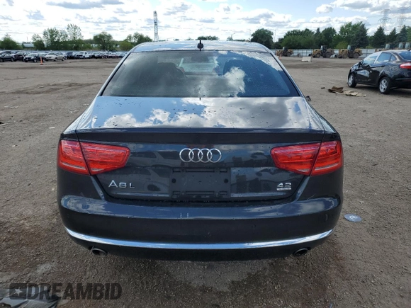 2012 Audi A8 z VIN WAURVAFD2CN021722, wystawiony jako Copart lot #58353745 z przebiegiem 117 302 mil mil oraz Szkoda całkowita • Salvage title. Historia ofert i sprzedaży dostępna na DreamBid. Obrazek 6.