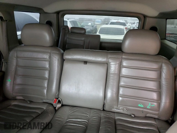 2003 Hummer H2 with VIN 5GRGN23U83H143843, listed as a Copart auction lot 43792915 with 115,569 mi miles and Salvage Title. Bid and sale history available at carsss.com. Image 10.