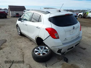 2016 Buick Encore Premium with VIN KL4CJDSB3GB607132, listed as a IAAI auction lot 41526249 with 50,617 mi miles and . Bid and sale history available at carsss.com. Image 3.