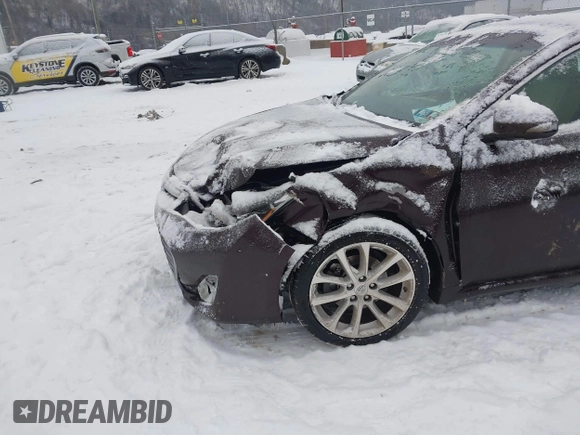 2014 Toyota Avalon Limited with VIN 4T1BK1EB1EU106004, listed as a IAAI auction lot 41341771 with 86,608 mi miles and . Bid and sale history available at DreamBid. Image 6.