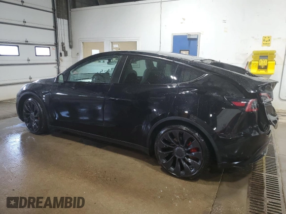 2022 Tesla Model Y Performance z VIN 7SAYGDEF7NF523532, wystawiony jako Copart lot #59949915 z przebiegiem 50 428 mil mil oraz Szkoda całkowita • Salvage title. Historia ofert i sprzedaży dostępna na DreamBid. Obrazek 2.