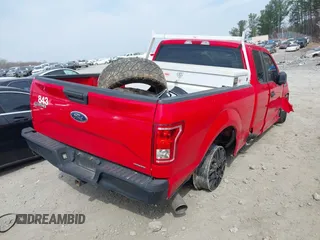 2015 Ford F-150 XL with VIN 1FTEX1CF4FFB01314, listed as a IAAI auction lot 41793296 with 141,347 mi miles. Bid and sale history available at carsss.com. Image 4.