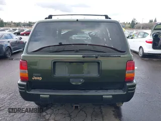1996 Jeep Grand Cherokee Limited with VIN 1J4GZ78S0TC235692, listed as a IAAI auction lot 41945617 with Not provided miles and . Bid and sale history available at DreamBid. Image 16.