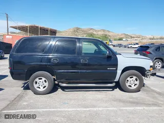 2001 Chevrolet Tahoe LT with VIN 1GNEC13T31R122882, listed as a IAAI auction lot 41999271 with 211,687 mi miles. Bid and sale history available at carsss.com. Image 14.