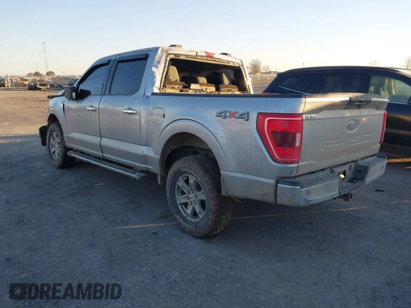 2021 Ford F-150 XL with VIN 1FTFW1E56MFA46051, listed as a IAAI auction lot 41342210 with 94,729 mi miles. Bid and sale history available at carsss.com. Image 3.