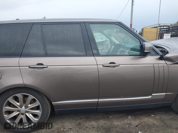 2015 Land Rover Range Rover HSE z VIN SALGS2VF4FA220237, wystawiony jako IAAI lot #41087301 z przebiegiem 110 309 mil mil oraz . Historia ofert i sprzedaży dostępna na DreamBid. Obrazek 14.