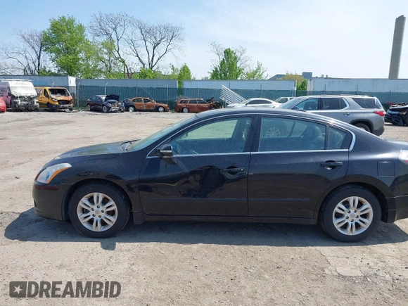 2011 Nissan Altima 2.5 S with VIN 1N4AL2AP5BN516577, listed as a IAAI auction lot 42112826 with 98,512 mi miles. Bid and sale history available at carsss.com. Image 6.