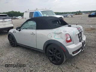 2015 MINI Roadster S z VIN WMWSY3C55FT595894, wystawiony jako Copart lot #56257194 z przebiegiem 66 704 mil mil oraz Szkody całkowita. Historia ofert i sprzedaży dostępna na DreamBid. Obrazek 2.