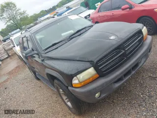 2003 Dodge Durango Sport with VIN 1D4HS38N33F589676, listed as a IAAI auction lot 41981858 with 328,996 mi miles. Bid and sale history available at carsss.com. Image 1.