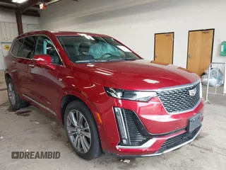2020 Cadillac XT6 AWD Premium Luxury z VIN 1GYKPDRS0LZ215534, wystawiony jako IAAI lot #42299906 z przebiegiem 23 004 mil mil oraz . Historia ofert i sprzedaży dostępna na DreamBid. Obrazek 1.