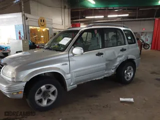 2000 Suzuki Grand Vitara JLX with VIN JS3TD62V1Y4101244, listed as a IAAI auction lot 41635060 with 169,951 mi miles. Bid and sale history available at carsss.com. Image 6.