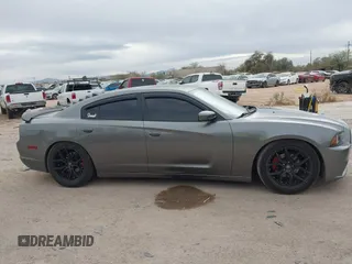 2012 Dodge Charger SXT with VIN 2C3CDXHG8CH244592, listed as a IAAI auction lot 41548991 with 116,855 mi miles. Bid and sale history available at carsss.com. Image 13.