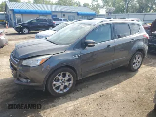 2015 Ford Escape Titanium with VIN 1FMCU0JX6FUA25138, listed as a Copart auction lot 54566965 with 125,337 mi miles and Salvage title. Bid and sale history available at DreamBid. Image 1.