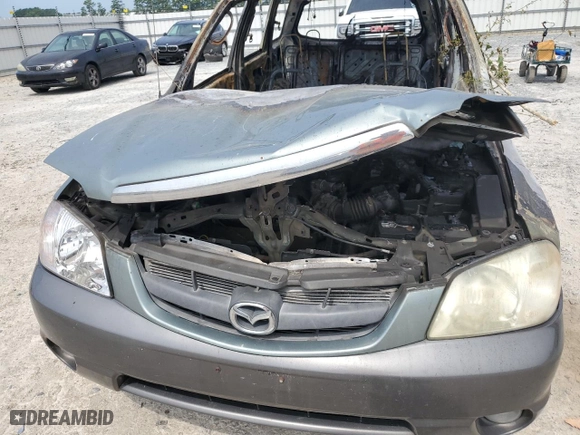 2004 Mazda Tribute LX with VIN 4F2YZ04174KM10199, listed as a Copart auction lot 65833594 with 0 mi miles and Non Repairable. Bid and sale history available at carsss.com. Image 12.
