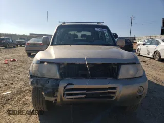 2005 Mitsubishi Montero Limited z VIN JA4MW51S65J000349, wystawiony jako Copart lot #77456554 z przebiegiem 173 334 mil mil oraz Szkoda całkowita • Salvage title. Historia ofert i sprzedaży dostępna na DreamBid. Obrazek 5.