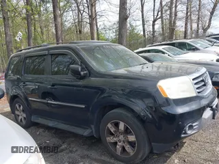 2012 Honda Pilot Touring with VIN 5FNYF4H92CB051260, listed as a IAAI auction lot 41906802 with 256,691 mi miles. Bid and sale history available at carsss.com. Image 13.