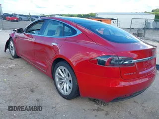 2017 Tesla Model S 60 with VIN 5YJSA1E14HF199130, listed as a IAAI auction lot 42544333 with 72,858 mi miles and . Bid and sale history available at DreamBid. Image 3.