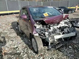 2013 Scion iQ with VIN JTNJJXB00DJ022017, listed as a Copart auction lot 82717994 with Not provided miles and Salvage title. Bid and sale history available at DreamBid. Image 10.