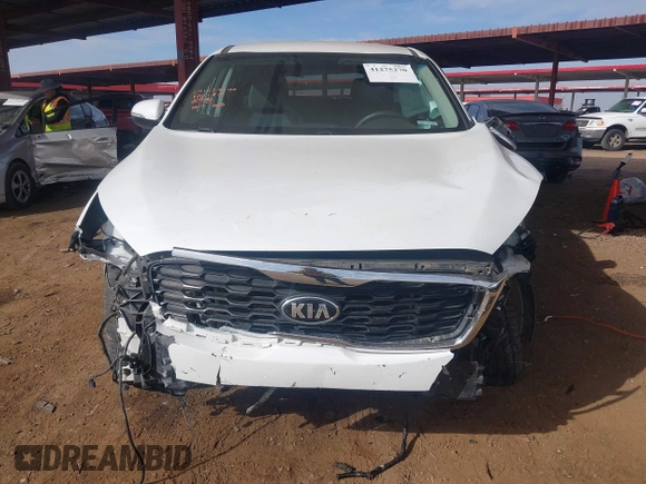 2019 Kia Sorento LX z VIN 5XYPG4A36KG611142, wystawiony jako IAAI lot #41275270 z przebiegiem 97 421 mil mil oraz . Historia ofert i sprzedaży dostępna na DreamBid. Obrazek 6.