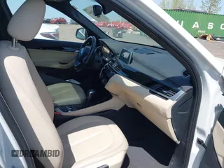 2018 BMW X1 xDrive28i with VIN WBXHT3C39J5F91912, listed as a IAAI auction lot 42099647 with 79,023 mi miles and . Bid and sale history available at DreamBid. Image 5.