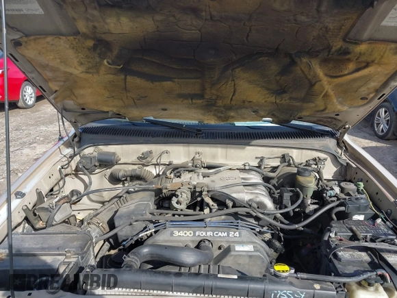1999 Toyota Tacoma PreRunner with VIN 4TASN92NXXZ563923, listed as a IAAI auction lot 41588706 with 348,134 mi miles and . Bid and sale history available at DreamBid. Image 10.