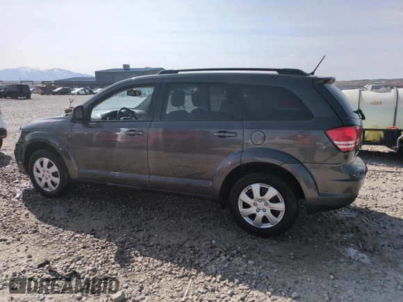 2016 Dodge Journey SE with VIN 3C4PDCAB4GT249709, listed as a Copart auction lot 52209685 with 143,923 mi miles and Salvage Title. Bid and sale history available at carsss.com. Image 2.