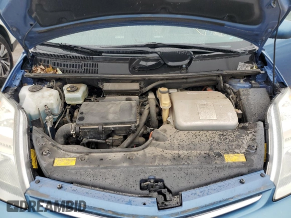 2007 Toyota Prius z VIN JTDKB20U977675087, wystawiony jako Copart lot #58346235 z przebiegiem 146 082 mil mil oraz Szkoda całkowita • Salvage title. Historia ofert i sprzedaży dostępna na DreamBid. Obrazek 12.
