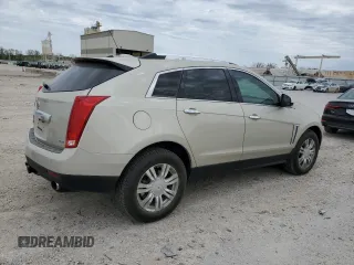 2015 Cadillac SRX Luxury Collection z VIN 3GYFNEE33FS606531, wystawiony jako Copart lot #53088485 z przebiegiem 115 140 mil mil oraz Szkody całkowita. Historia ofert i sprzedaży dostępna na DreamBid. Obrazek 3.