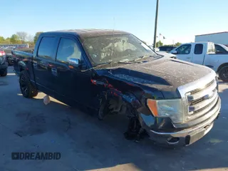 2014 Ford F-150 XL with VIN 1FTEW1CM6EFB40597, listed as a IAAI auction lot 41832554 with 159,192 mi miles. Bid and sale history available at carsss.com. Image 1.