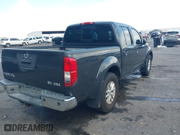 2015 Nissan Frontier SV with VIN 1N6AD0EV6FN751948, listed as a IAAI auction lot 42063935 with 52,244 mi miles and . Bid and sale history available at DreamBid. Image 4.