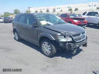 2015 Dodge Journey American Value Pkg with VIN 3C4PDCAB7FT556919, listed as a IAAI auction lot 42087599 with 100,574 mi miles. Bid and sale history available at carsss.com. Image 1.