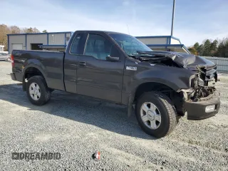 2005 Ford F-150 XL with VIN 1FTRF14W65NB91606, listed as a Copart auction lot 84889894 with 157,947 mi miles and Salvage Title. Bid and sale history available at carsss.com. Image 4.