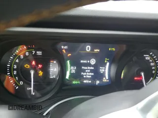 2024 Jeep Wrangler Sahara with VIN 1C4RJXP65RW210689, listed as a Copart auction lot 66482724 with 4,872 mi miles and Salvage Title. Bid and sale history available at DreamBid. Image 9.