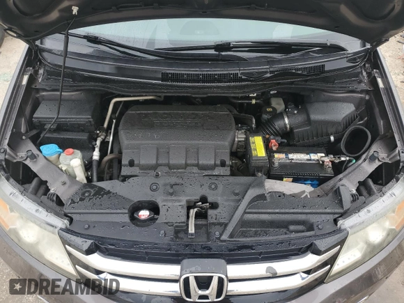 2015 Honda Odyssey Touring Elite with VIN 5FNRL5H95FB117985, listed as a Copart auction lot 57178695 with 199,757 mi miles and Non repairable. Bid and sale history available at DreamBid. Image 12.