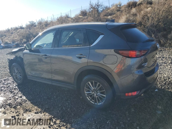 2017 Mazda CX-5 Touring with VIN JM3KFBCL2H0204097, listed as a Copart auction lot 88173195 with 76,884 mi miles and Salvage Title. Bid and sale history available at carsss.com. Image 2.