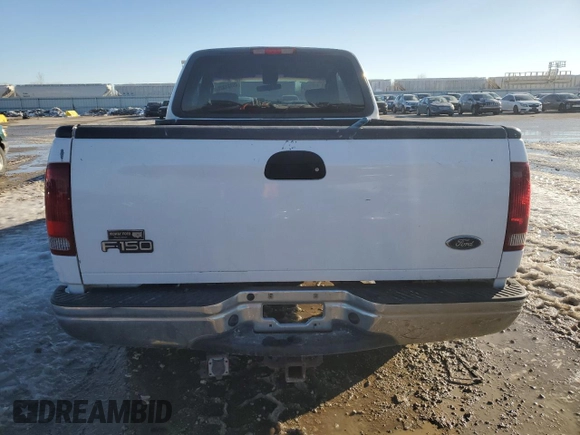 2002 Ford F-150 XL with VIN 1FTRX17L42KD35973, listed as a Copart auction lot 89121325 with 258,895 mi miles and Salvage title. Bid and sale history available at DreamBid. Image 6.