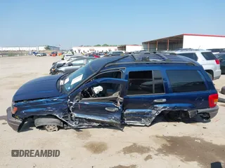 2000 Jeep Grand Cherokee Laredo with VIN 1J4G248S5YC413977, listed as a IAAI auction lot 42045808 with Not provided miles and . Bid and sale history available at DreamBid. Image 14.