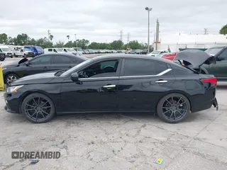 2019 Nissan Altima S with VIN 1N4BL4BV0KC158913, listed as a IAAI auction lot 41990156 with 162,406 mi miles and . Bid and sale history available at carsss.com. Image 14.